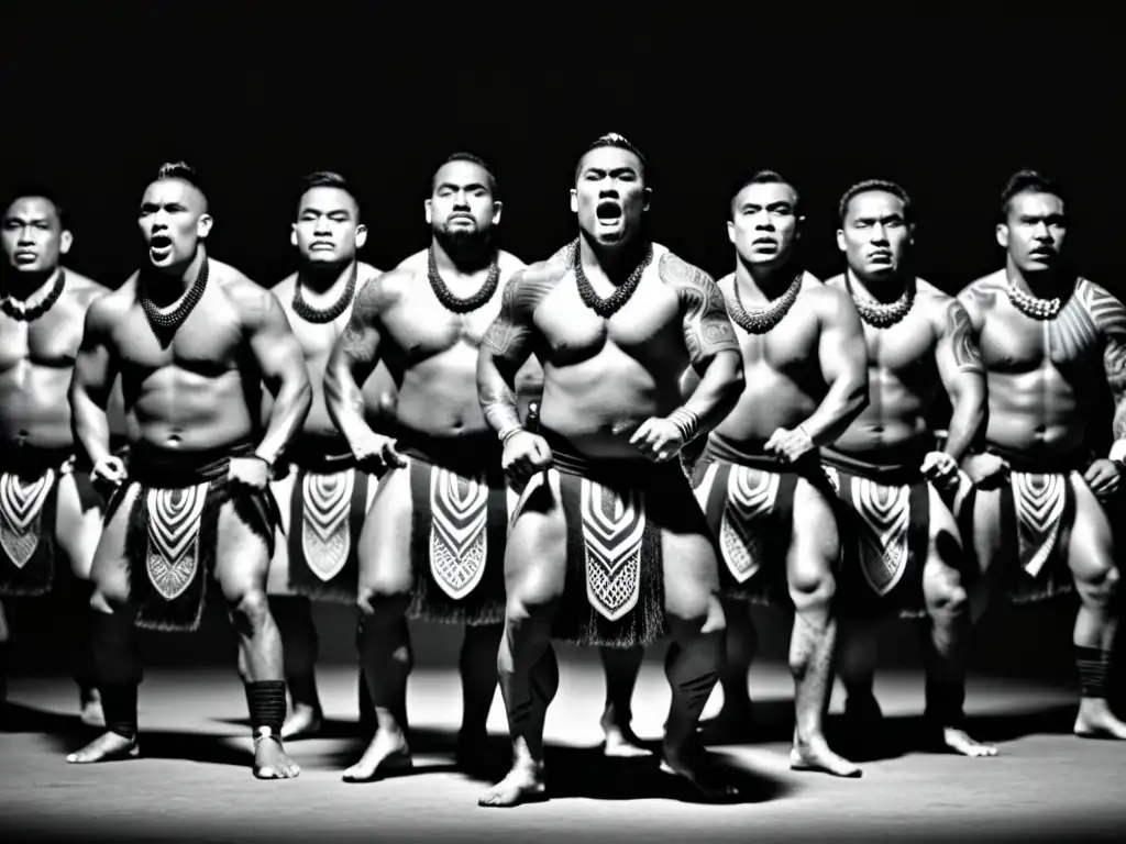 Grupo de guerreros maoríes ejecutando la danza haka, manifestando la filosofía de la estrategia en Oceanía con intensidad y tradición guerrera