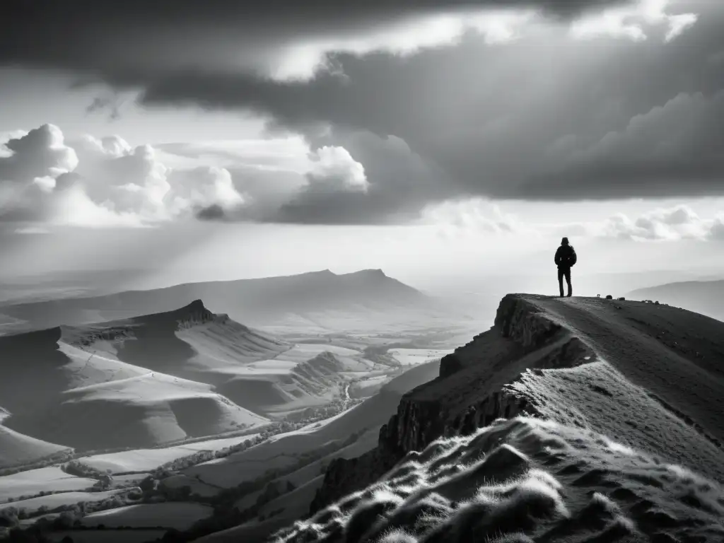 El poder de la contemplación: figura solitaria en el acantilado Silueta contemplativa en el borde de un acantilado, admirando un paisaje montañoso